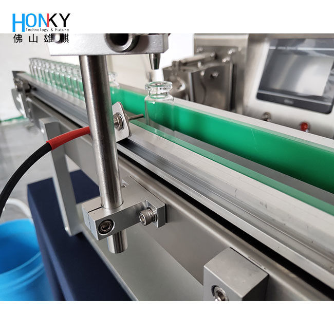 Desktop lijn type Vial Filling Machine Kleine vullijn Met fles Voeding Conveyor En Samll Bach Voor huidverzorging Olie vullen